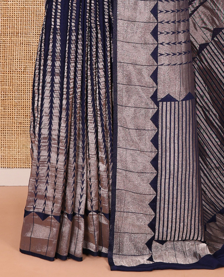 Navy blue zari geometric fancy crepe saree, temple zari border, zari striped pallu, and a matching buttas woven blouse
