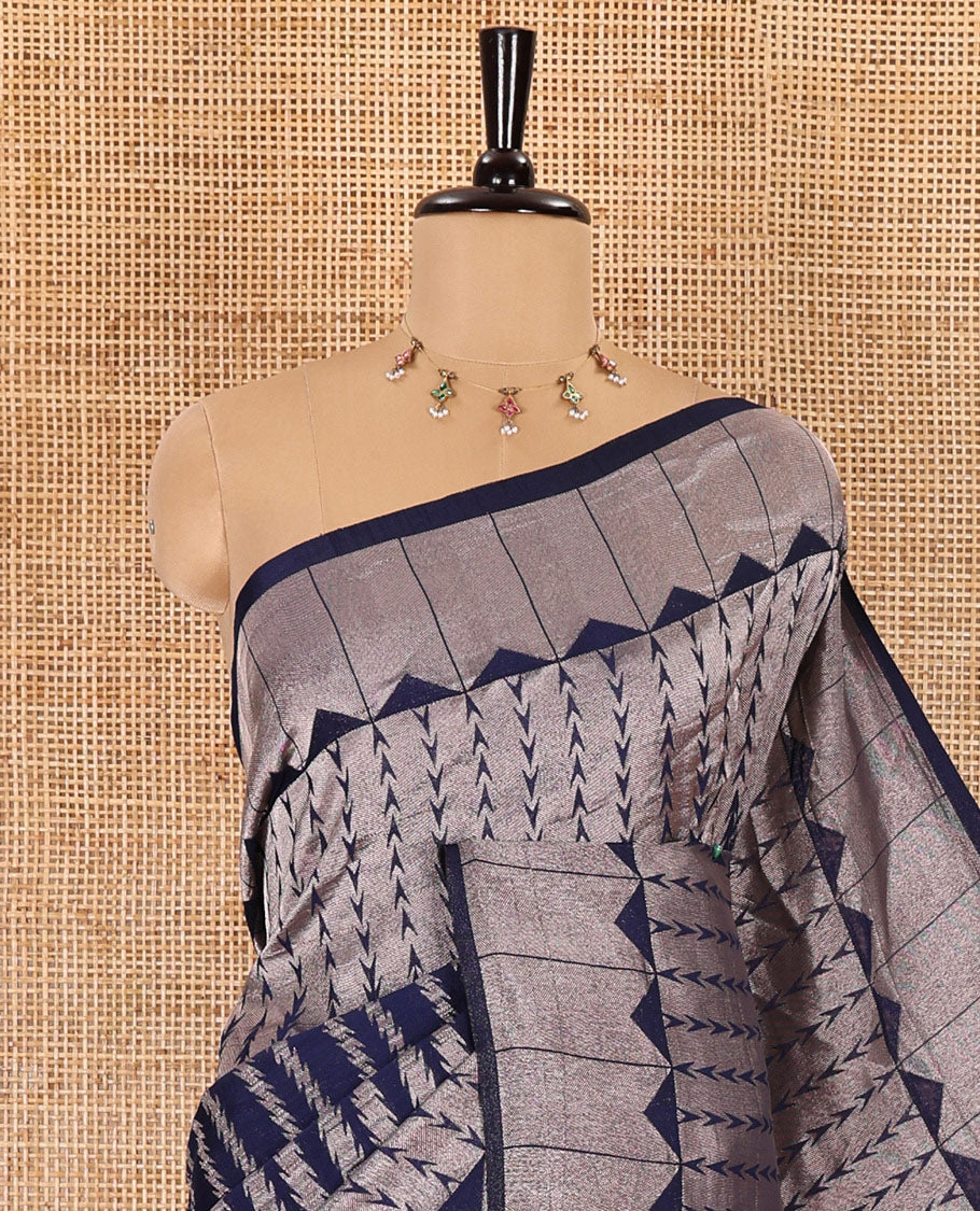 Navy blue zari geometric fancy crepe saree, temple zari border, zari striped pallu, and a matching buttas woven blouse
