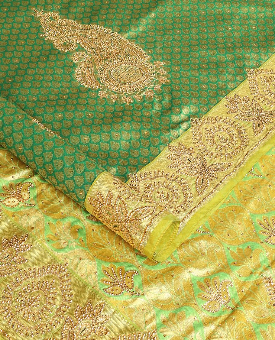 Green Orange leaf design vastrakala silk saree with stone work, contrast floral stone work scallop border & floral design in stone work pallu