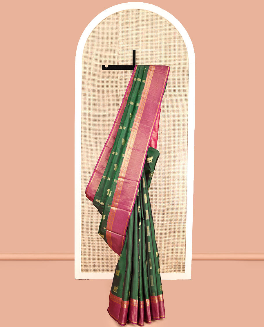 Green Vasundhara Lite Silk Mix Saree, Adorned with Pichwai Cow Buttas, Complemented by a Contrast Border of Rekku, Neli, and Yaanai Designs, Intricate Pallu, and a Contrast Blouse