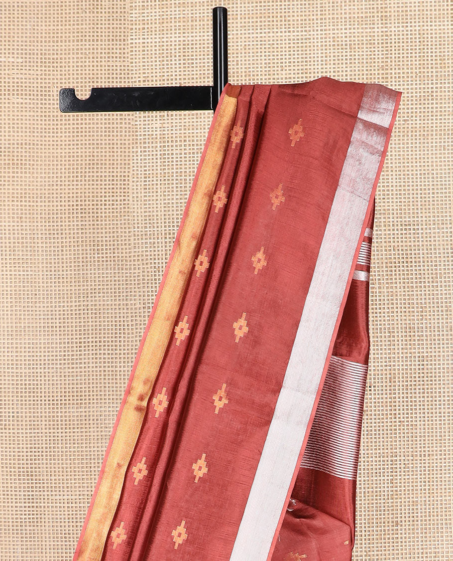 Terracotta red diamond buttas banana pith saree, silver and gold bavanji border, and zari striped pallu