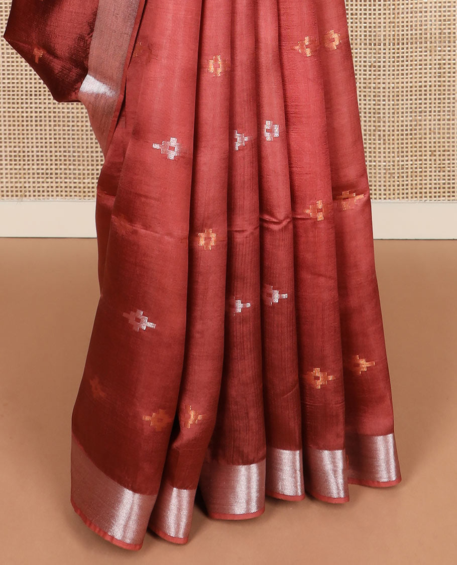 Terracotta red diamond buttas banana pith saree, silver and gold bavanji border, and zari striped pallu