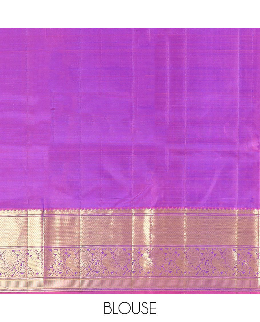 Blue Vasundhara Silk Saree Richly Detailed with Round Mayil Buttas, Highlighted with a Contrast Border of Muthu, Mayil Kann, and Mayil Designs, Grandly Zari Woven Pallu of Jaal Design, and Paired with a Contrast Blouse