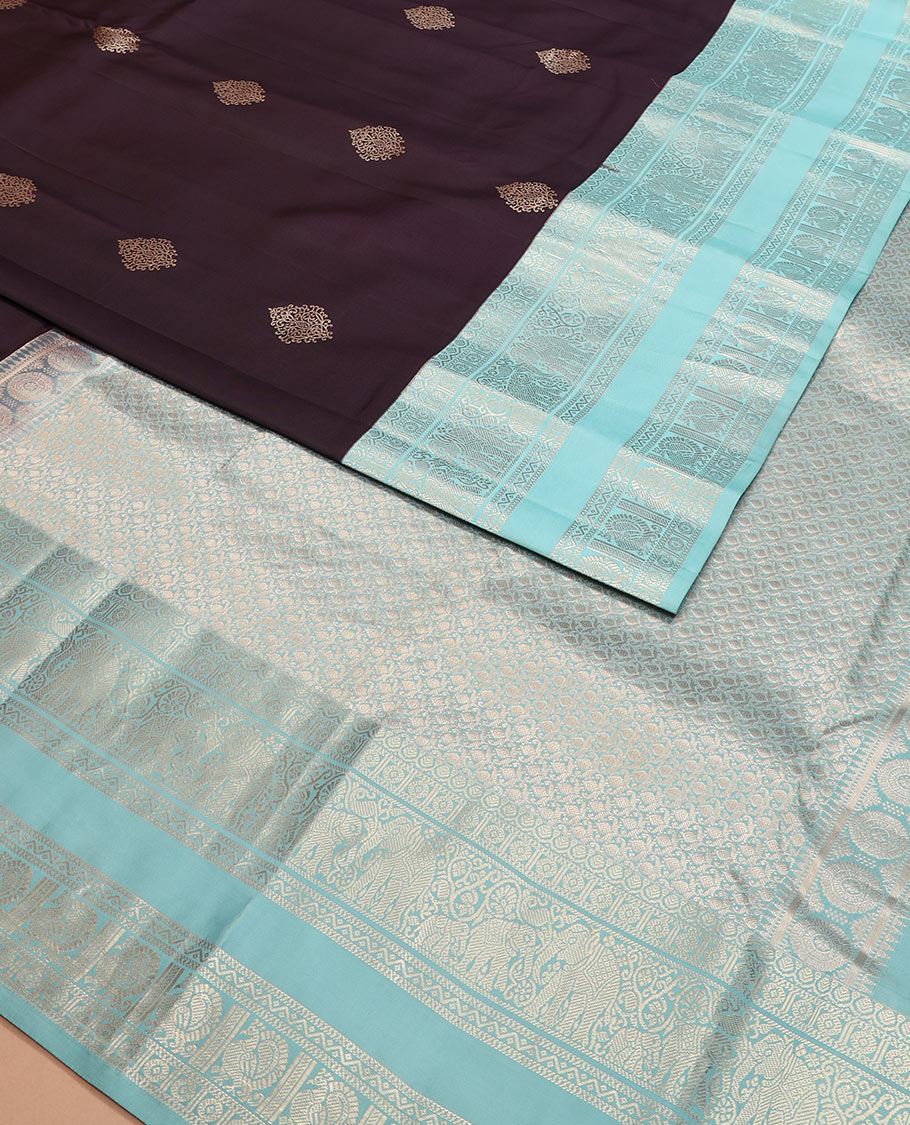 Brown zari buttas silk saree with contrast rettai pettu border of thilakam, yaanai, neli, and mayil designs, and intricate pallu