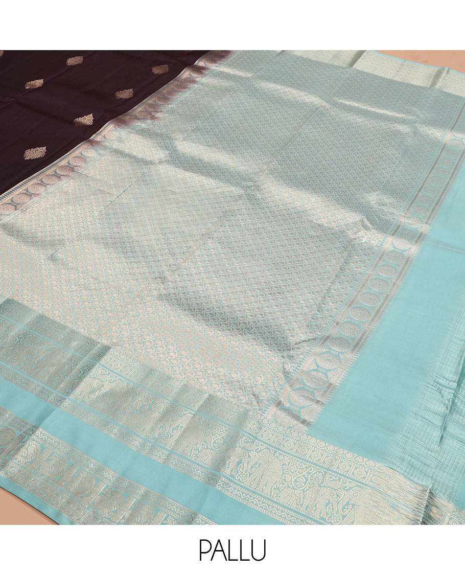 Brown zari buttas silk saree with contrast rettai pettu border of thilakam, yaanai, neli, and mayil designs, and intricate pallu