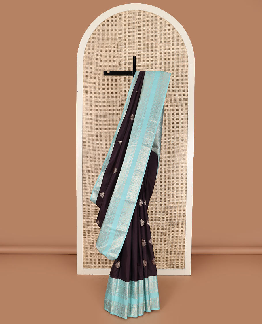 Brown zari buttas silk saree with contrast rettai pettu border of thilakam, yaanai, neli, and mayil designs, and intricate pallu