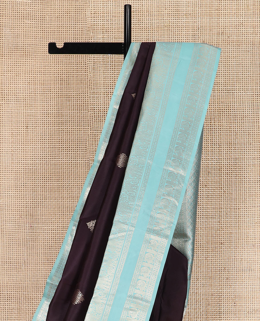 Brown zari buttas silk saree with contrast rettai pettu border of thilakam, yaanai, neli, and mayil designs, and intricate pallu