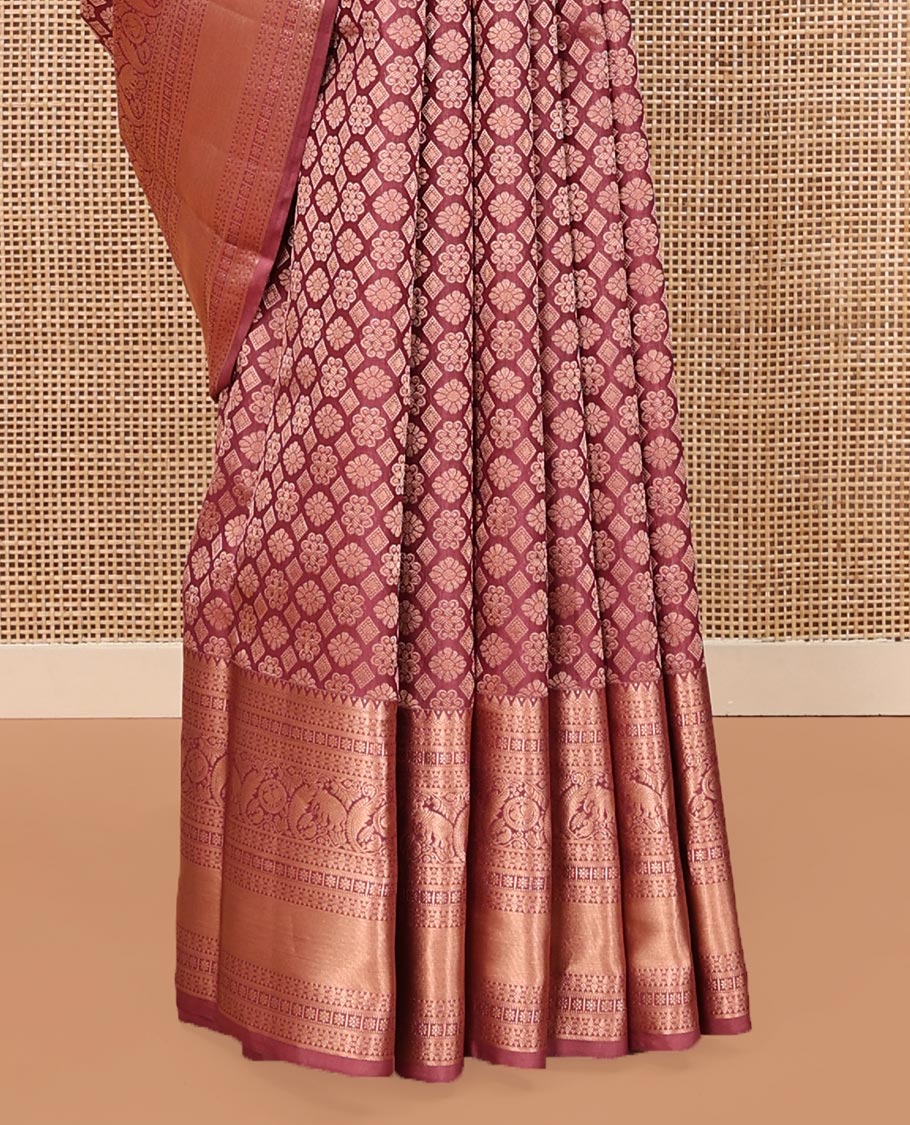 Rosewood Pink Kanchipuram Wedding Silk Saree, Artfully Detailed with Jacquard on Its Body, Highlighted by a Zari Border of Thilakam, Kamalam, Round Mayil, and Yaanai Designs, Opulently Embellished Pallu, and Paired with a Matching Blouse