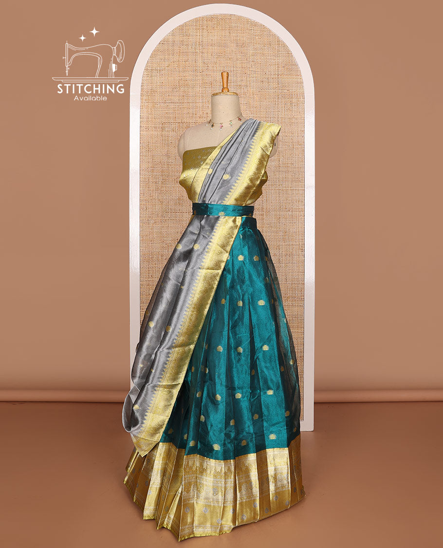 Blue floral buttas tissue half saree with contrast zari design border, jaal zari design blouse & floral design dhavani