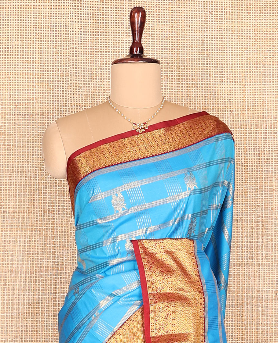 Light blue zari buttas and checked budget silk saree, contrast traditional zari woven border, and jaal pallu