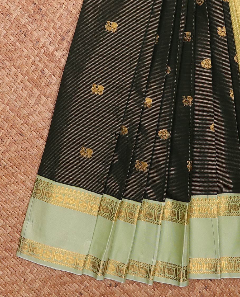 Green zari buttas and striped gift saree, contrast traditional zari rettai pettu design border, and intricate pallu