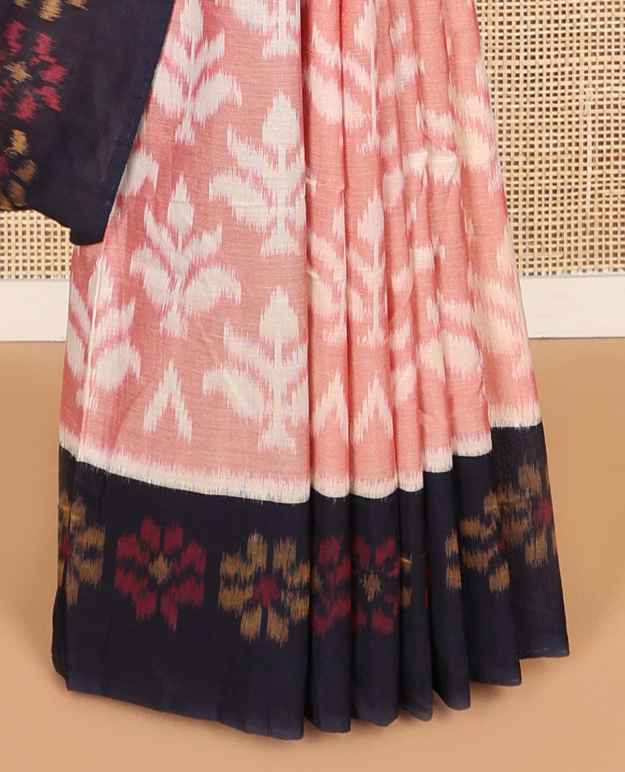 Peach floral ikkat cotton saree with contrast floral design border & floral design pallu