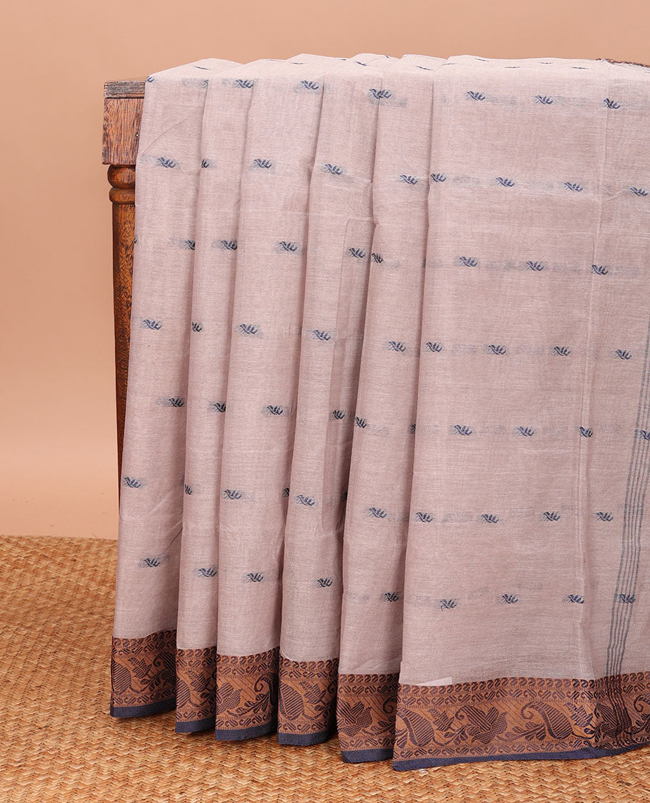 Pale Brown Bengal Cotton Saree, Decked up with Buttas All Over Its Body, Complemented by a Contrast Paisley Design Border, and Pallu Steeped with Stripes