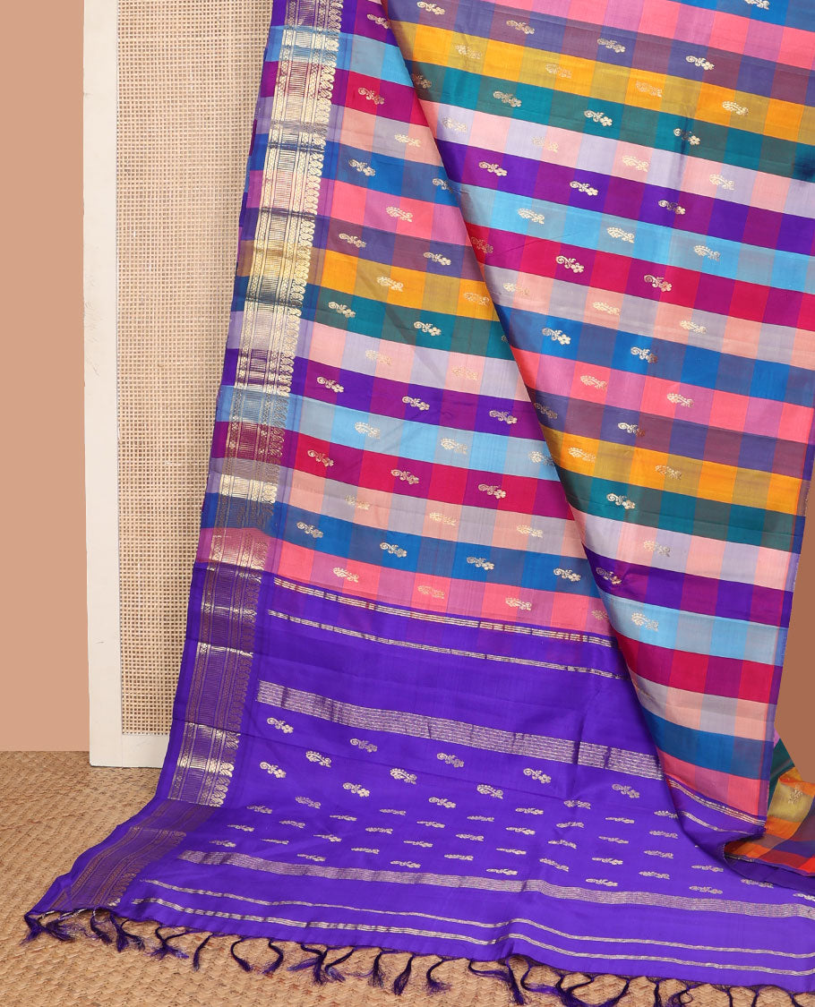 Multi-color paalum pazhamum style checked and zari buttas Kanchipuram silk saree, one-sided border of manga mokku, and then kuli kann designs, and contrast zari woven pallu