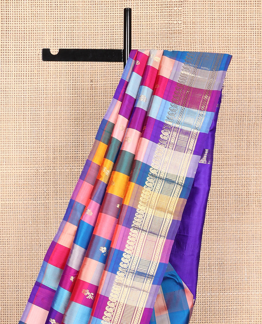 Multi-color paalum pazhamum style checked and zari buttas Kanchipuram silk saree, one-sided border of manga mokku, and then kuli kann designs, and contrast zari woven pallu