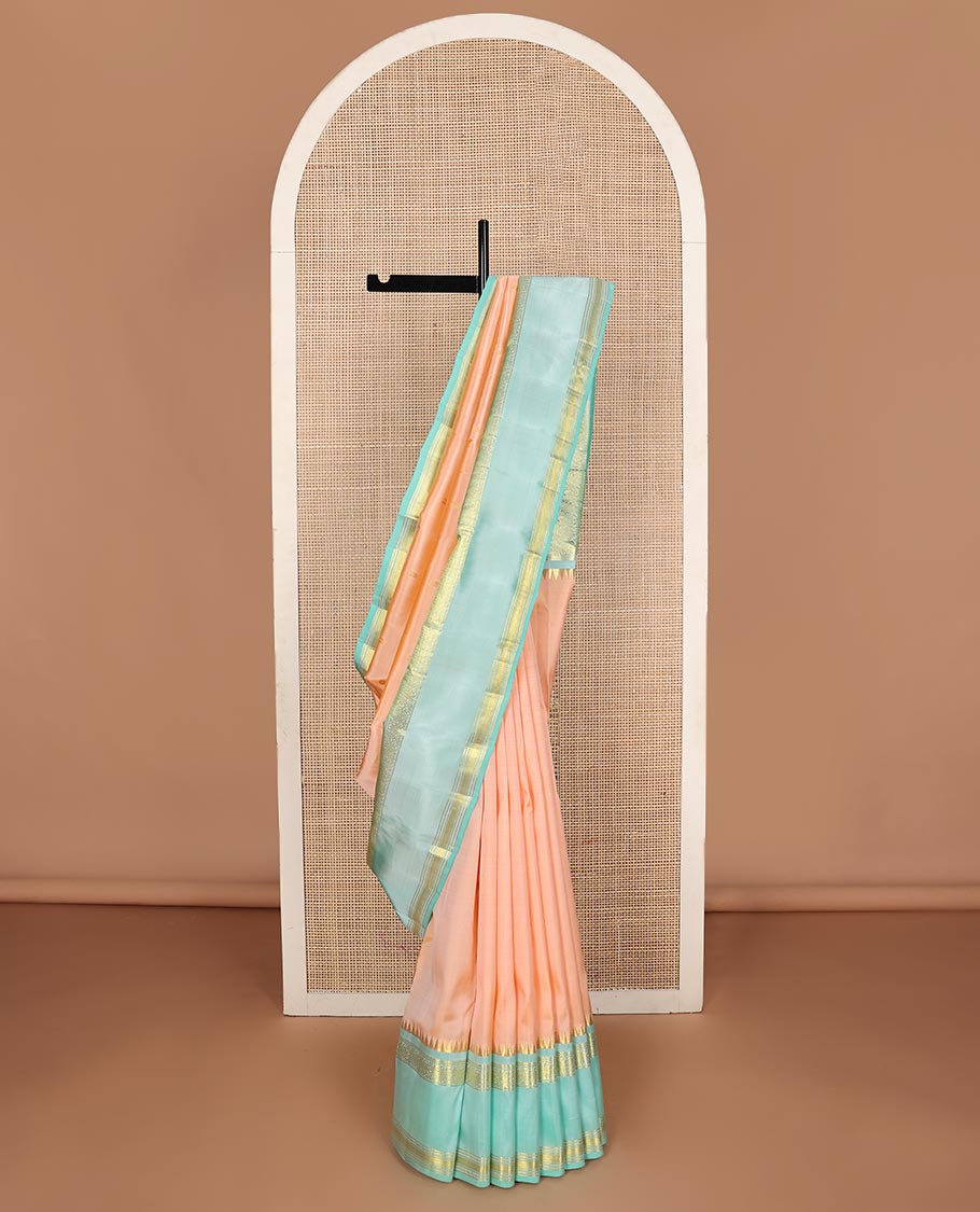 Light orange zari buttas Kanchipuram silk saree, contrast thazampoo rekku border of thilakam mokku,banaras,diamond, and kodi visiry designs and jaal pallu