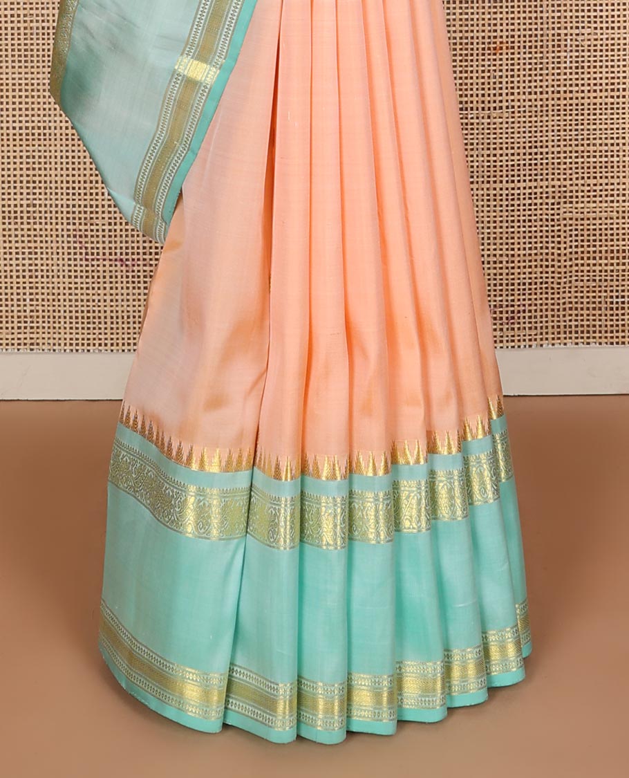 Light orange zari buttas Kanchipuram silk saree, contrast thazampoo rekku border of thilakam mokku,banaras,diamond, and kodi visiry designs and jaal pallu