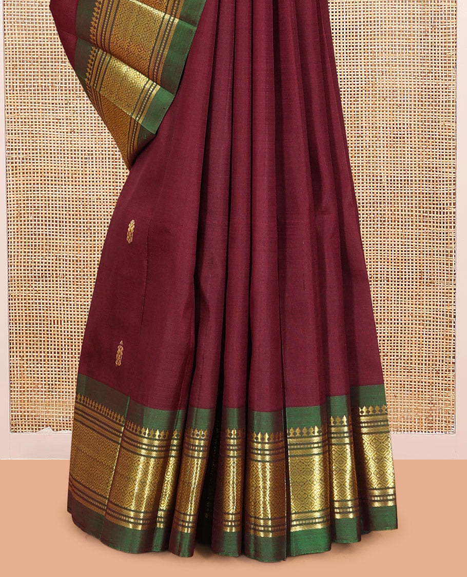 Brown Kanchipuram Silk Saree, Elevated with Zari Buttas, Complemented by a Contrast Border of Panner Sombu, Banaras, Muthu, and Jaal Design, Pallu of Zari Design, and No Blouse