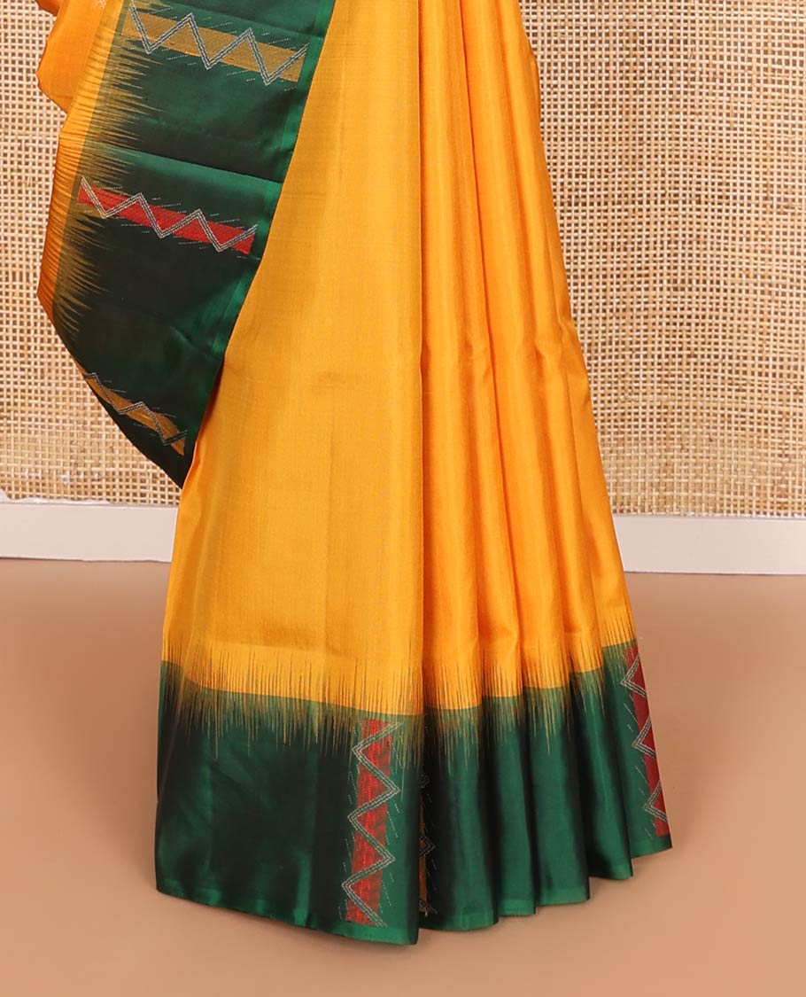 Yellow zari buttas soft silk saree, contrast border, and pallu of chevron stripes