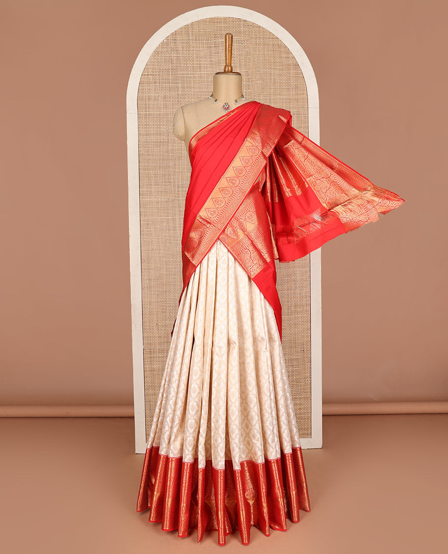 Cream pure silk half-saree, jacquard skirt, contrast traditional zari border, matching zari blouse, and zari design dhavani