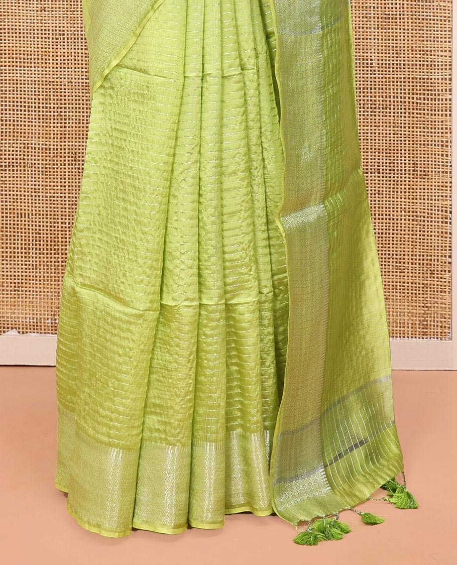 Green Banana Pith Saree, Sparsely Woven with Stripes All Over Its Body, Subtle Self-Border of Jaal Designs, Pallu Steeped with Stripes, and Paired with a Matching Blouse
