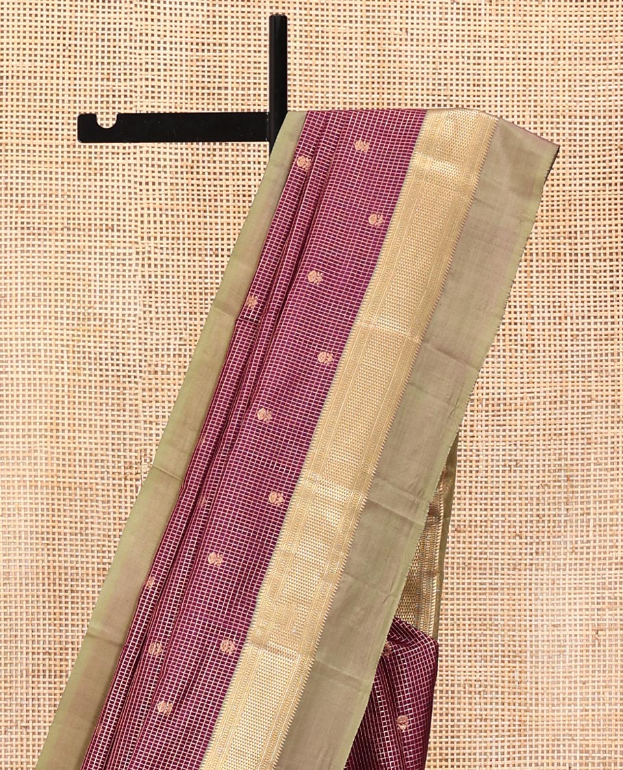 Maroon Vasundhara Silk Saree, Finely Crafted with Zari Butta and Checks All Over Its Body, Complemented by a Contrast Kal Eragina Border of Ara Bogudi, Muthu, and Ara Maadam Designs, Grand Jaal Pallu, and Paired with a Contrast Blouse