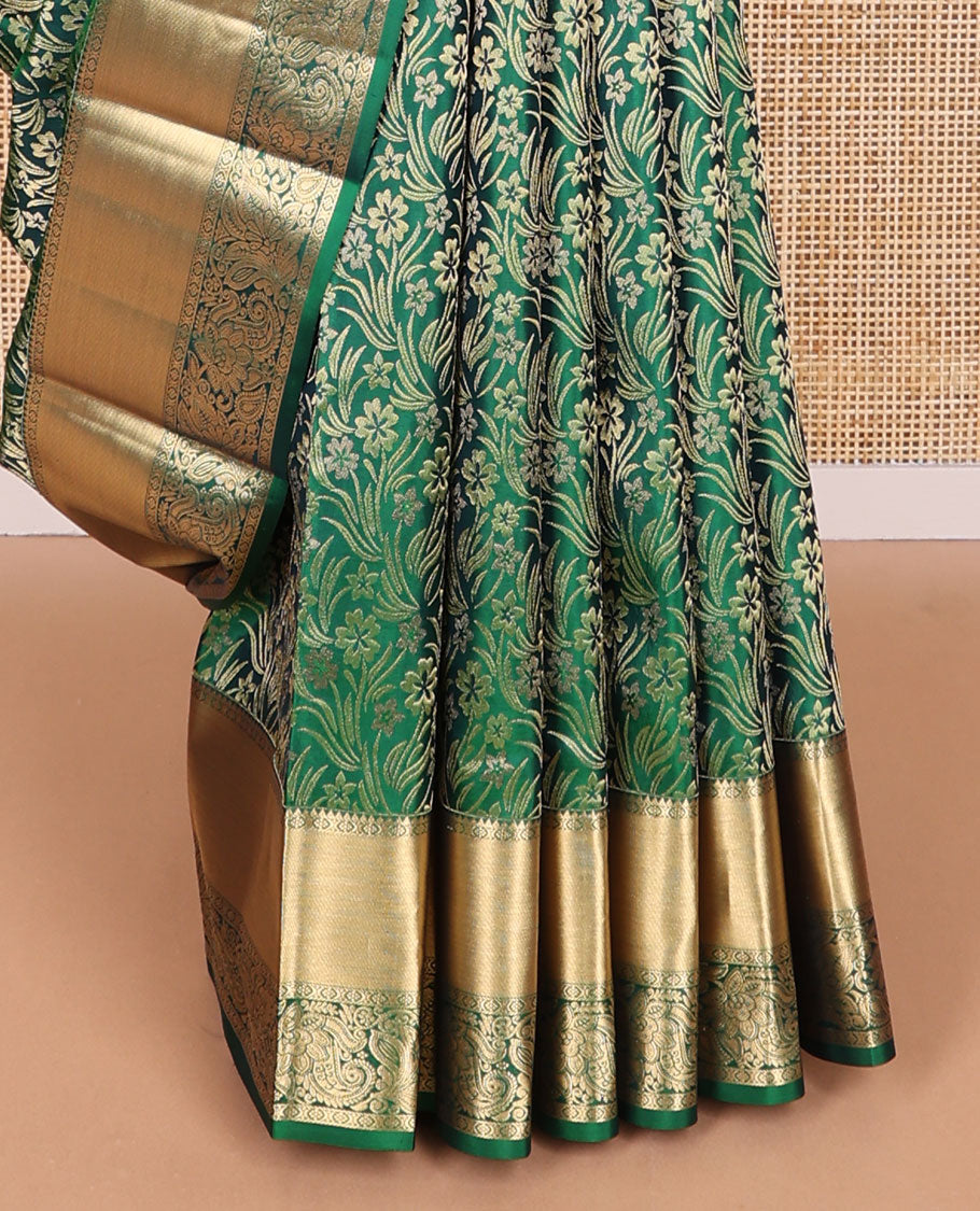 Green floral jacquard kancheepuram silk saree with self border of rekku, paun, banaras design floral pallu