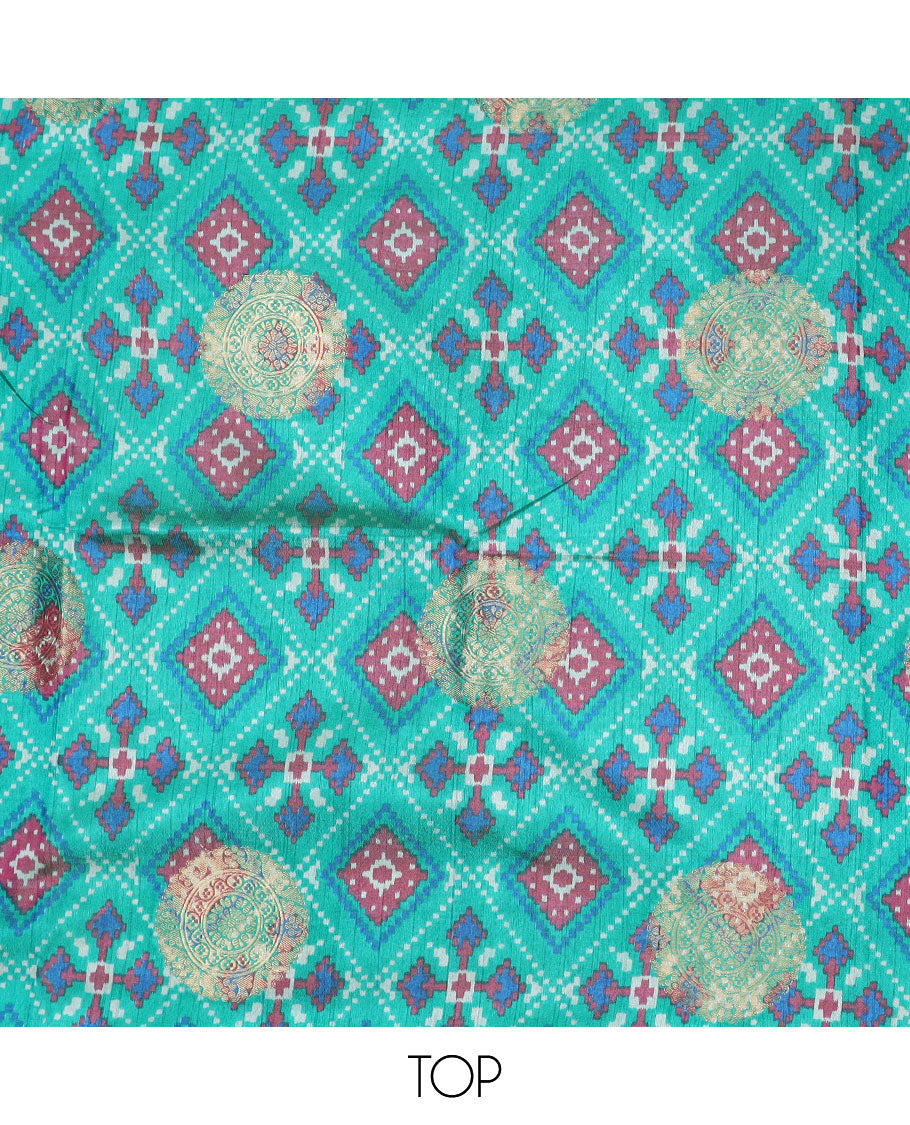 Turquoise material chudidhar,intricate print & butta patola silk top,contrast printed bottom & intricate dupatta