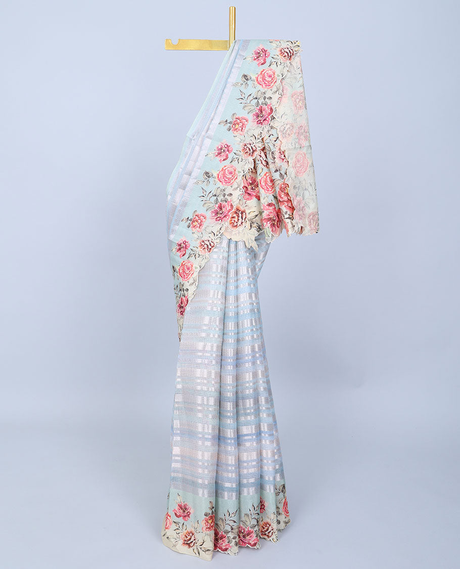 Blue zari designs Semi banaras jute saree, scallop border of traditional zari designs & floral printed pallu