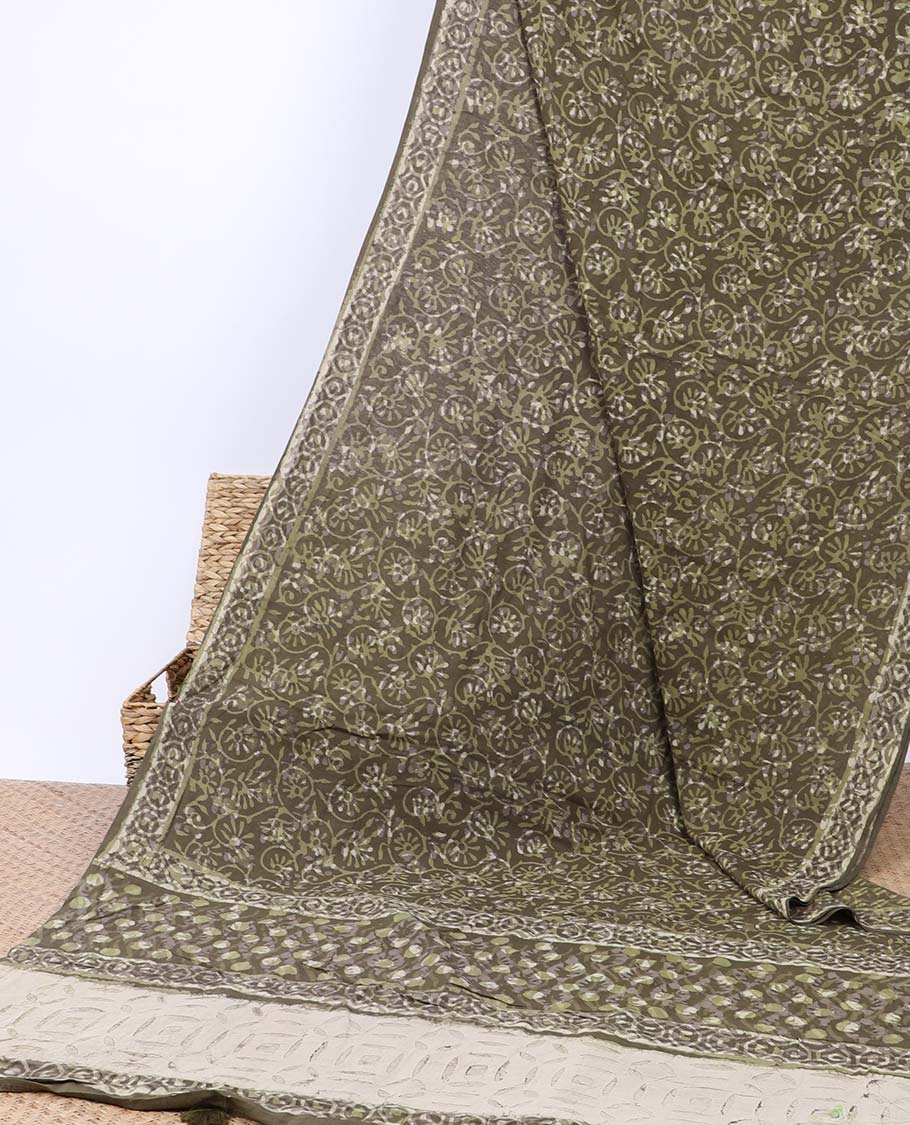 Green floral vine printed mul-mul cotton saree, self-border & pallu of intricate print