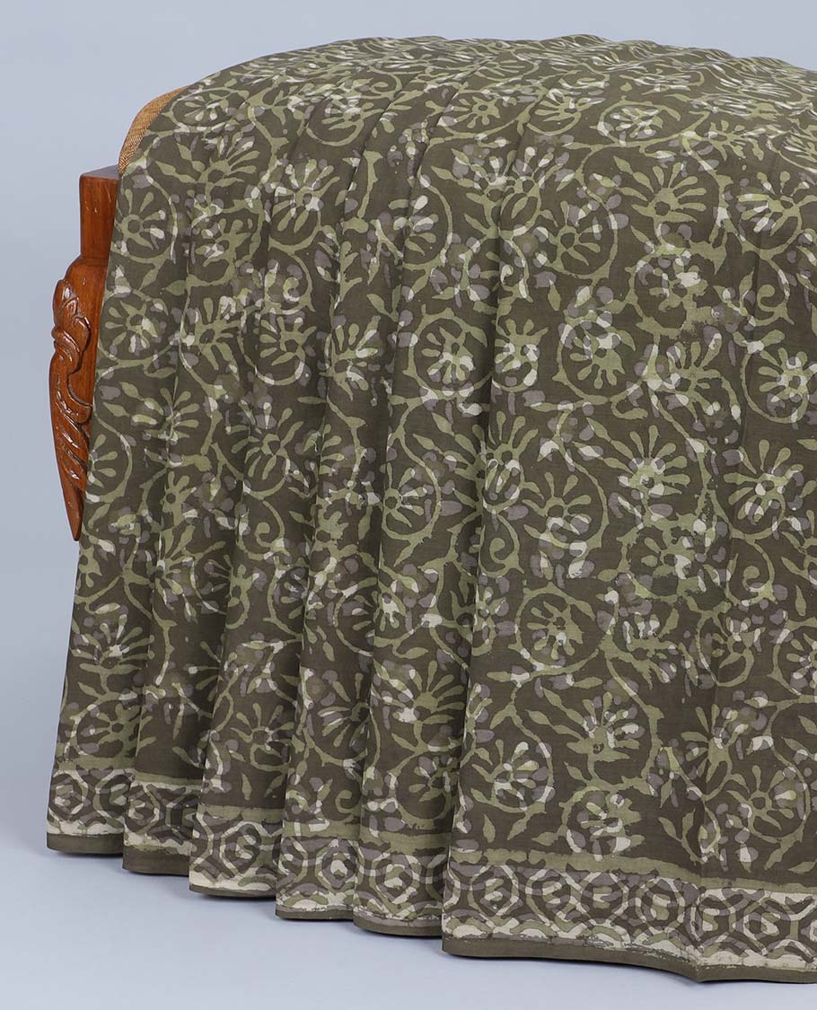 Green floral vine printed mul-mul cotton saree, self-border & pallu of intricate print