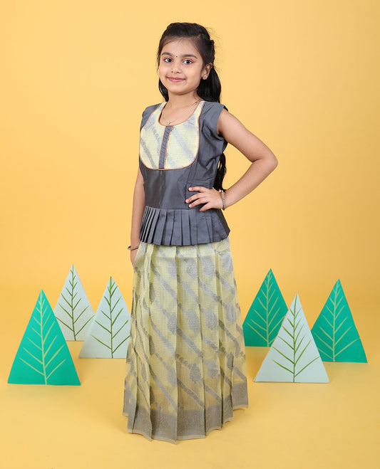 Pale yellow diagonal floral striped readymade art silk pavadai with zari border & sleeveless blouse