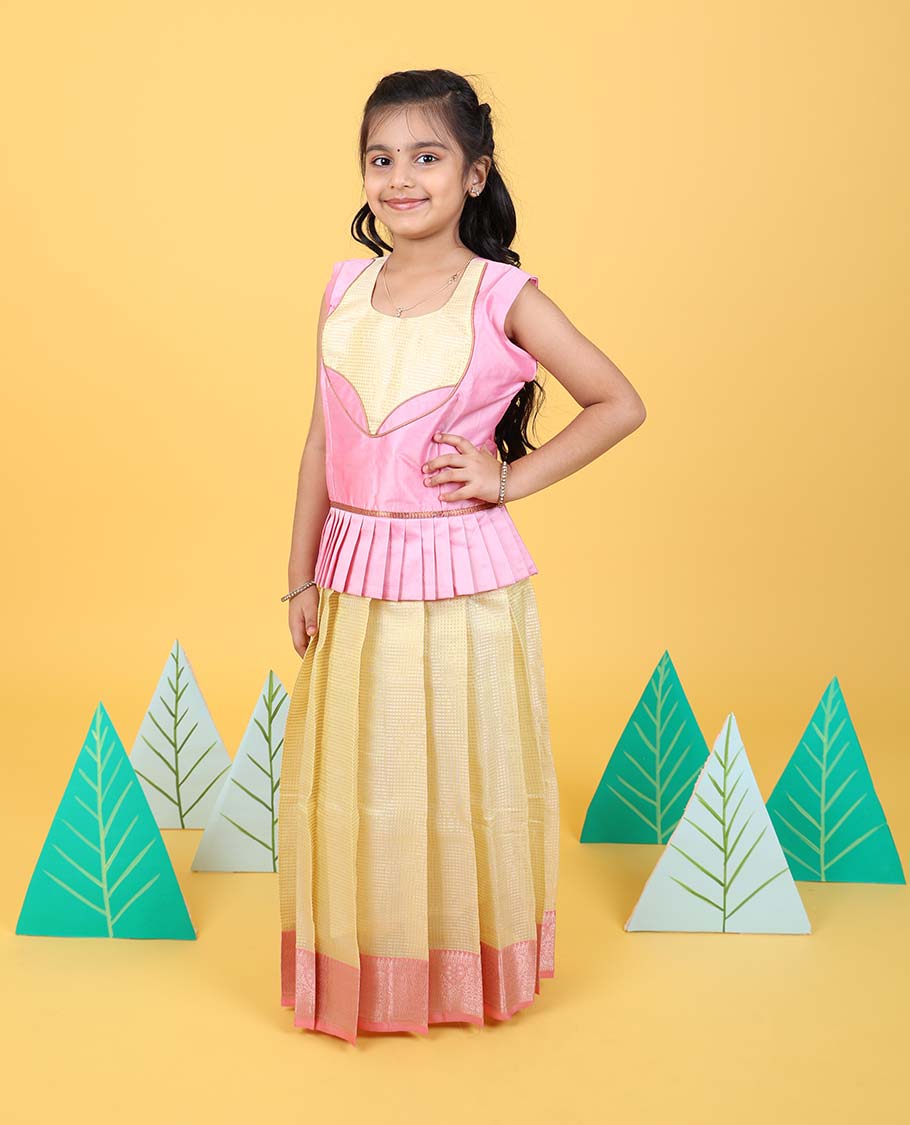 Yellow readymade art silk pavadai with contrast traditional zari border & sleeveless blouse