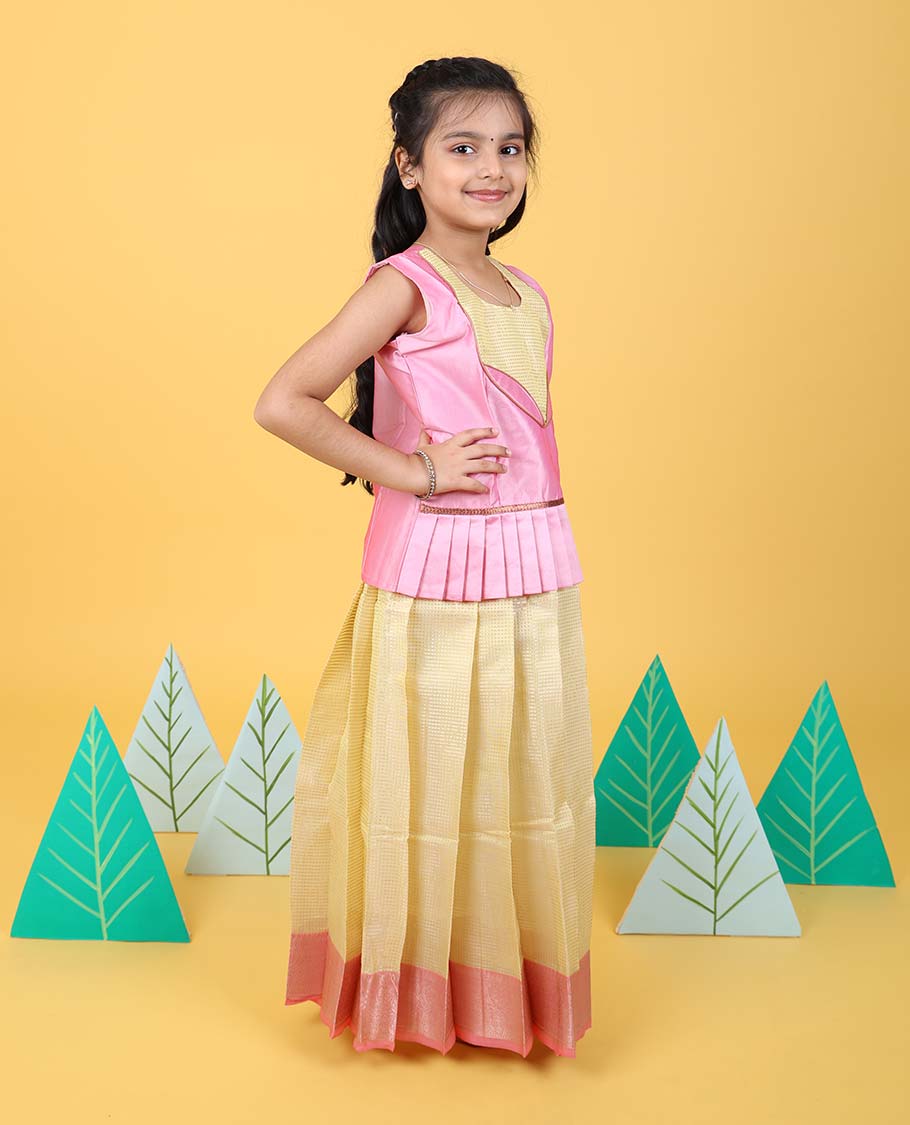 Yellow readymade art silk pavadai with contrast traditional zari border & sleeveless blouse