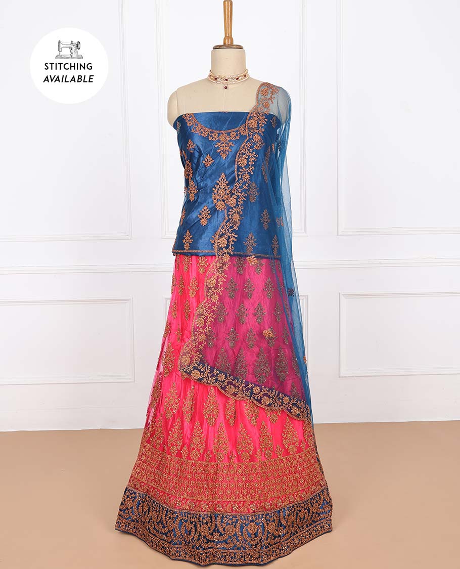 Fuchsia net lehenga with intricately embroidery skirt, contrast top & floral embroidered scallop dupatta