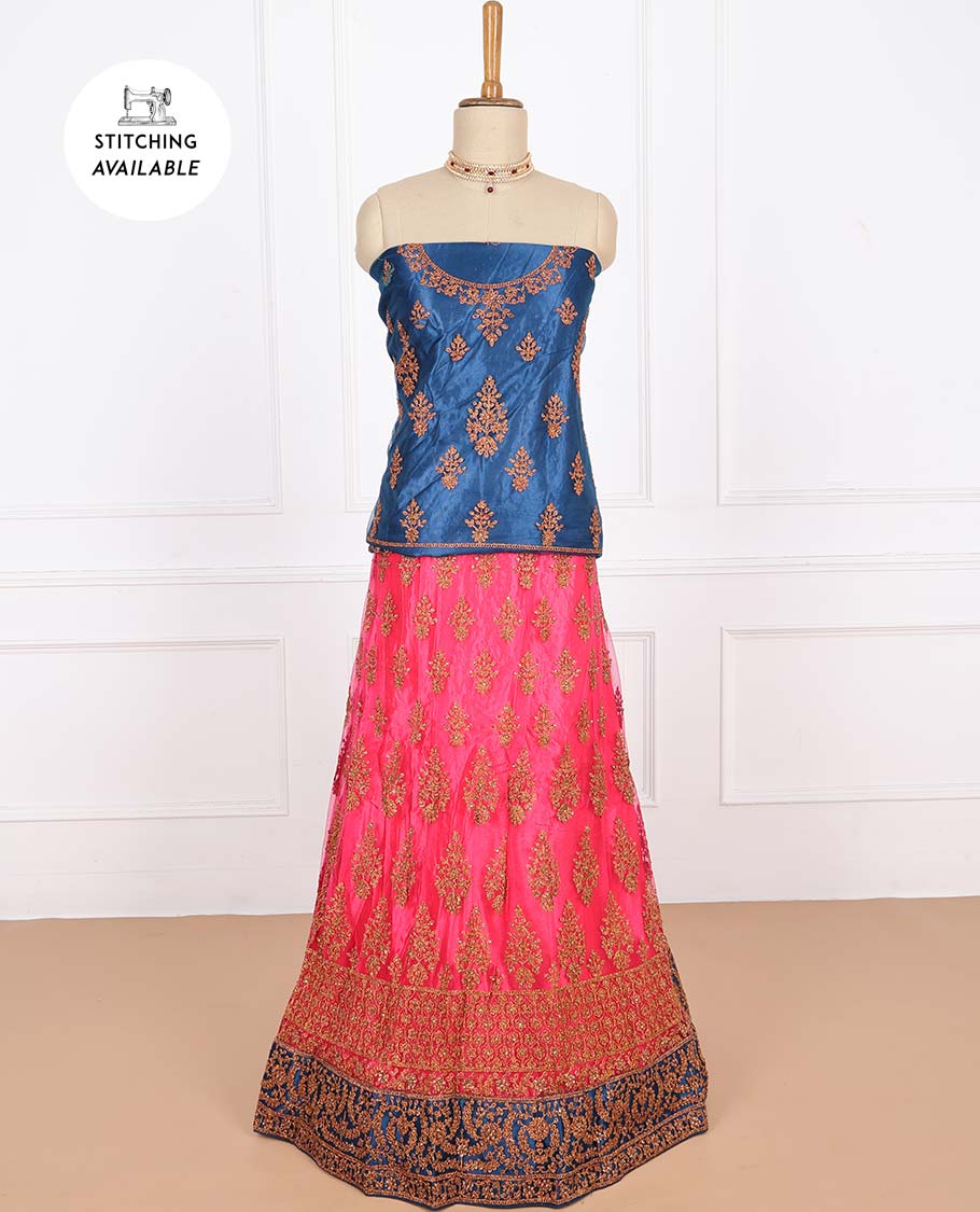 Fuchsia net lehenga with intricately embroidery skirt, contrast top & floral embroidered scallop dupatta
