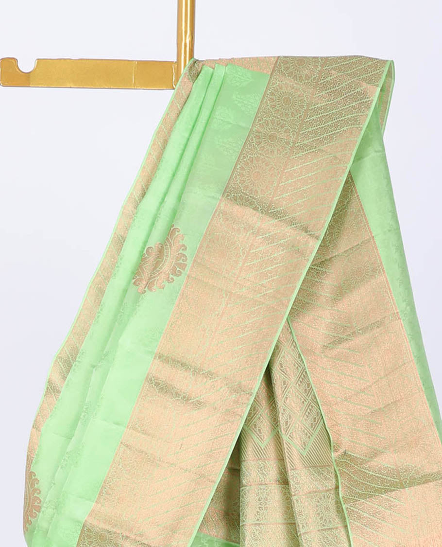 Green embossed bangalore silk saree with zari buttas, traditional zari border & pallu of jaal designs