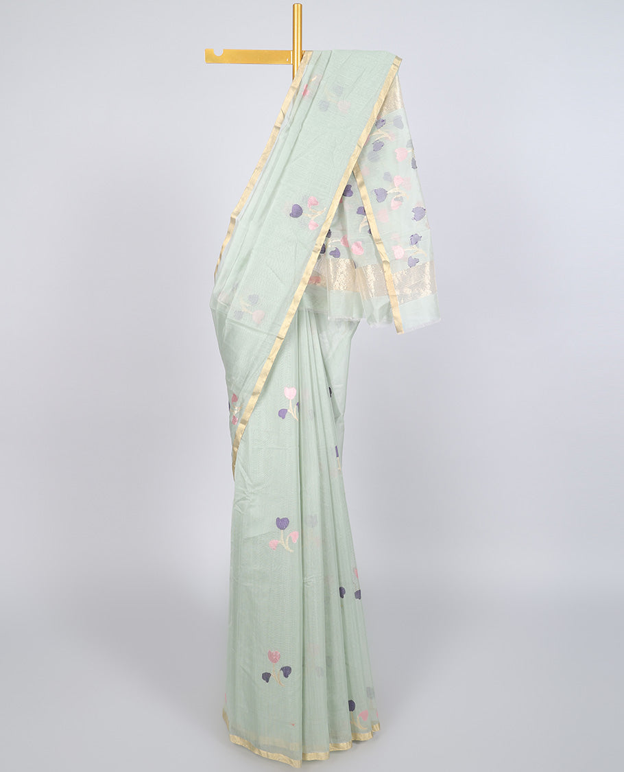 Pale green chanderi cotton saree with floral buttas, self-border & colorful floral design pallu