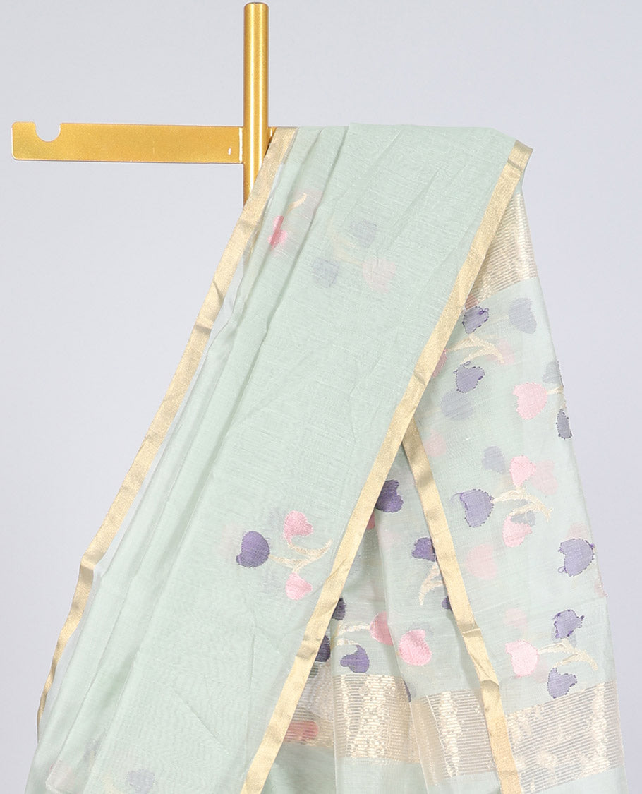 Pale green chanderi cotton saree with floral buttas, self-border & colorful floral design pallu