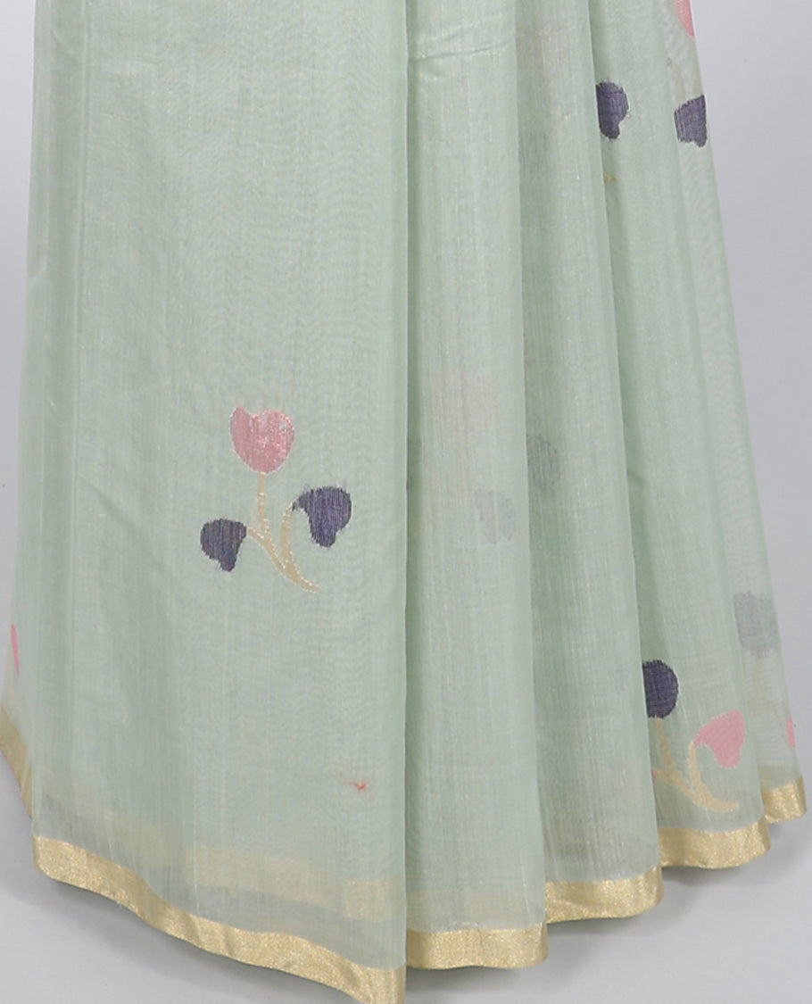 Pale green chanderi cotton saree with floral buttas, self-border & colorful floral design pallu