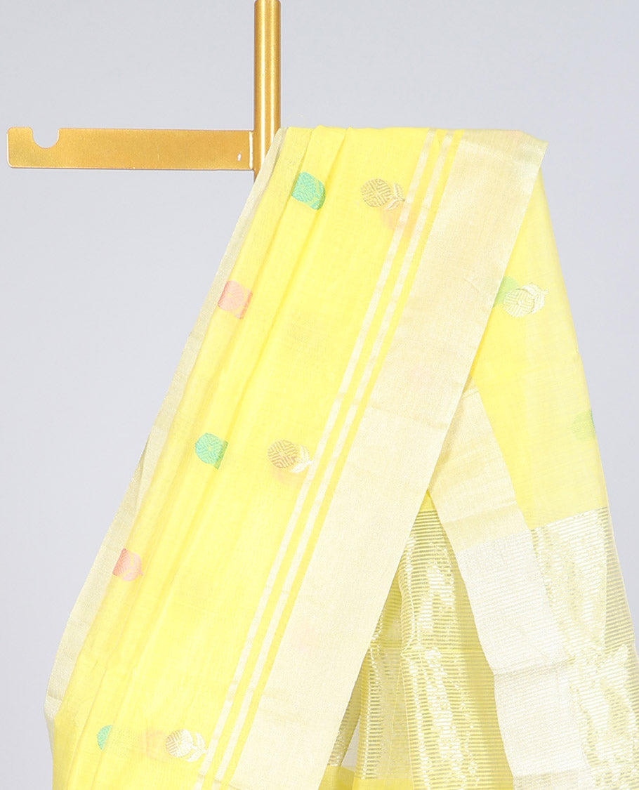 Yellow chanderi cotton saree with all-over buttas, zari border & pallu of stripes