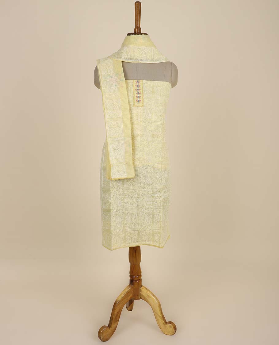 Yellow material chudidhar set, intricately embroidered top, plain bottom & floral embroidered dupatta