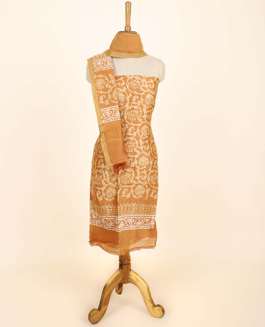 Orange material chudidhar set, floral vine printed top, plain bottom & batik-style floral printed dupatta