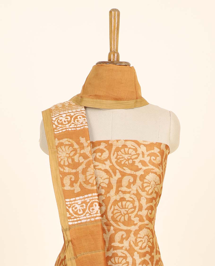 Orange material chudidhar set, floral vine printed top, plain bottom & batik-style floral printed dupatta