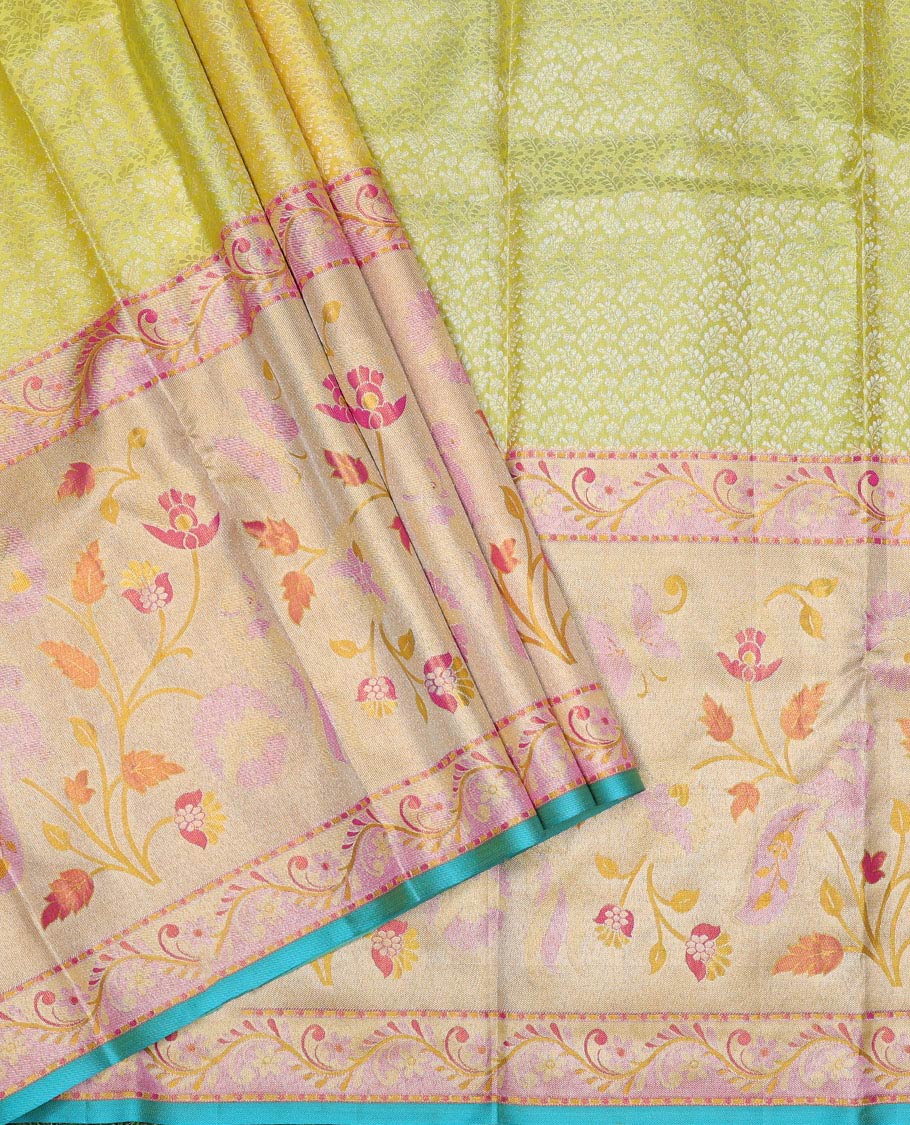 Yellow jacquard pure-silk half saree, contrast blouse, border of floral designs & dhavani of intricate designs