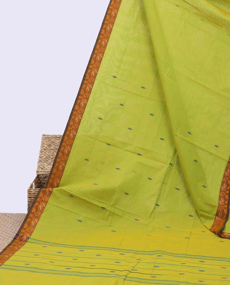 Green chettinad cotton saree with all-over buttas, contrast floral design border & pallu of stripes