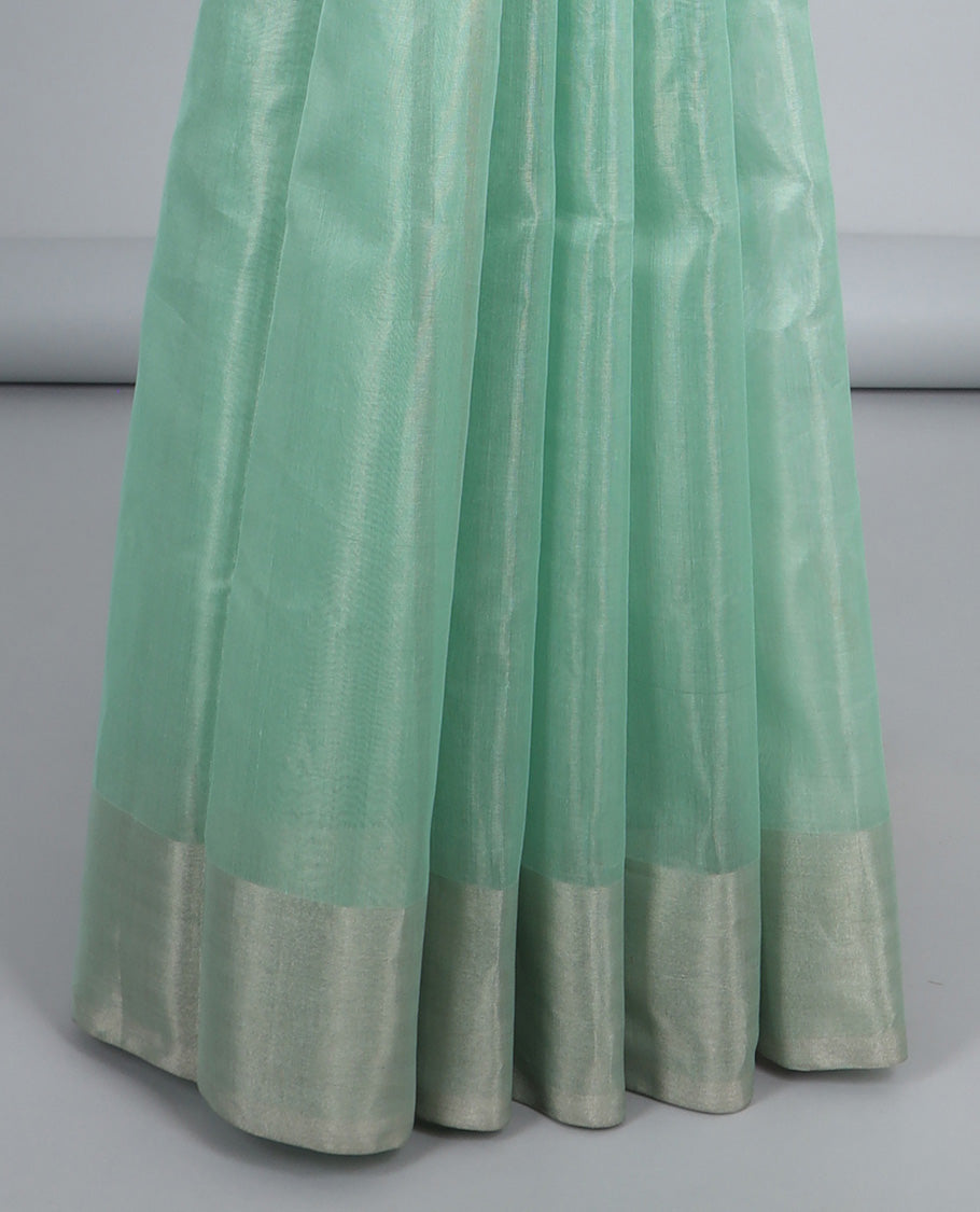 Green chanderi cotton saree, plain border & pallu of checked designs