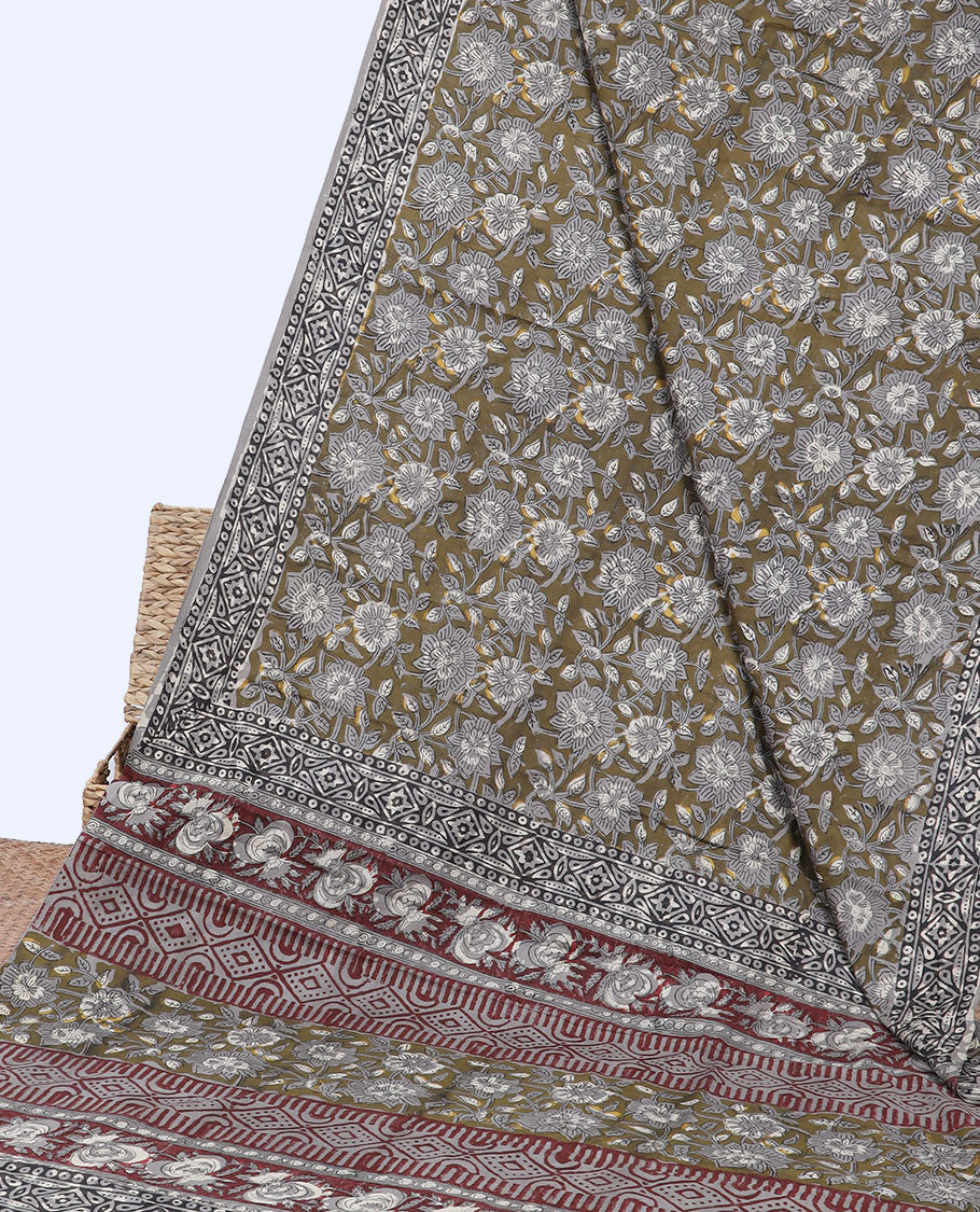 Green floral vine printed mul-mul cotton saree, contrast border & pallu steeped with geometric print