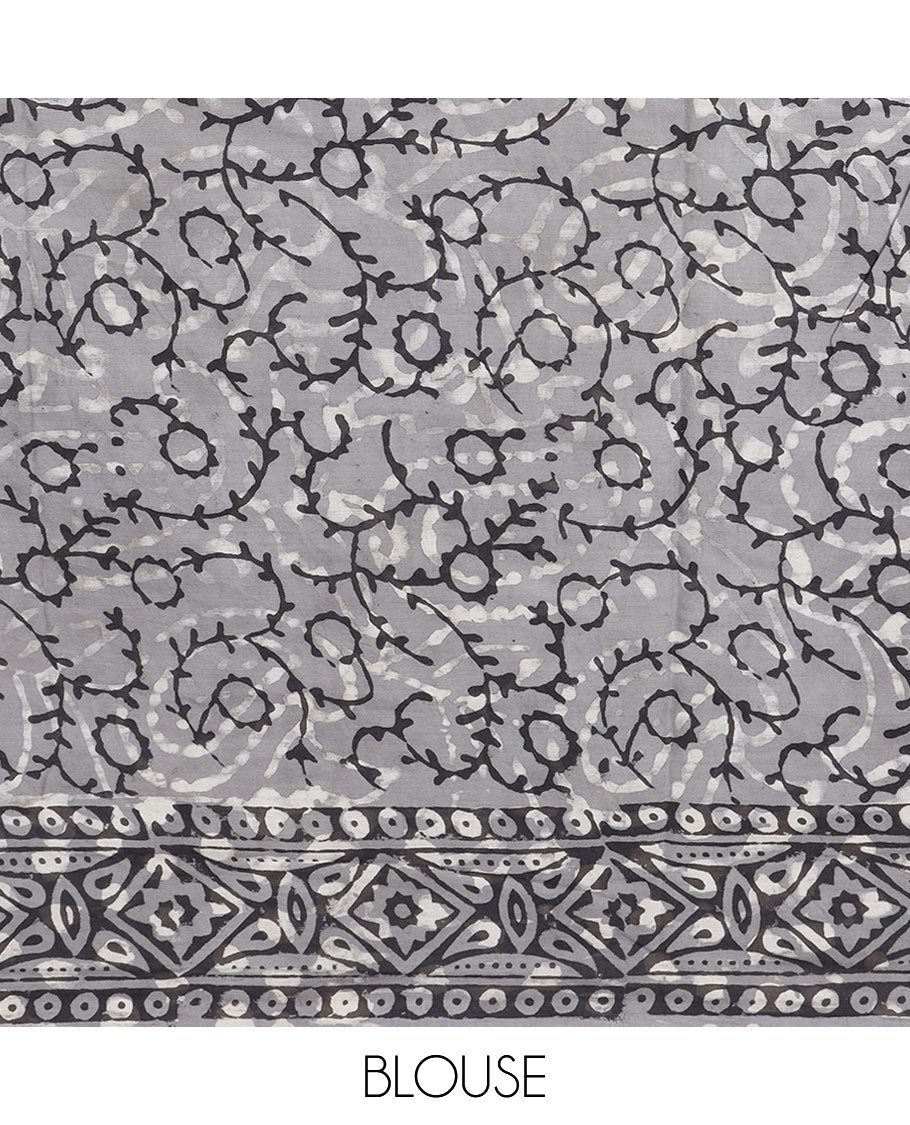 Green floral vine printed mul-mul cotton saree, contrast border & pallu steeped with geometric print