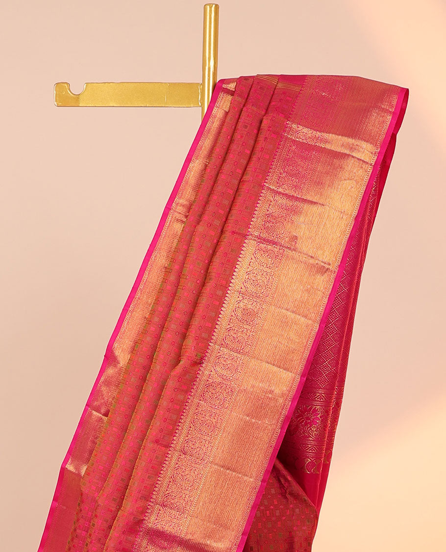 Orange embossed silksaree,contrast jaal design pallu & border of thilakam mokku,kathir,mayil & zari stripes